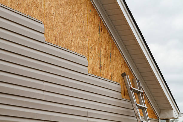 Professional Wood Siding technician working in North Beach, MD